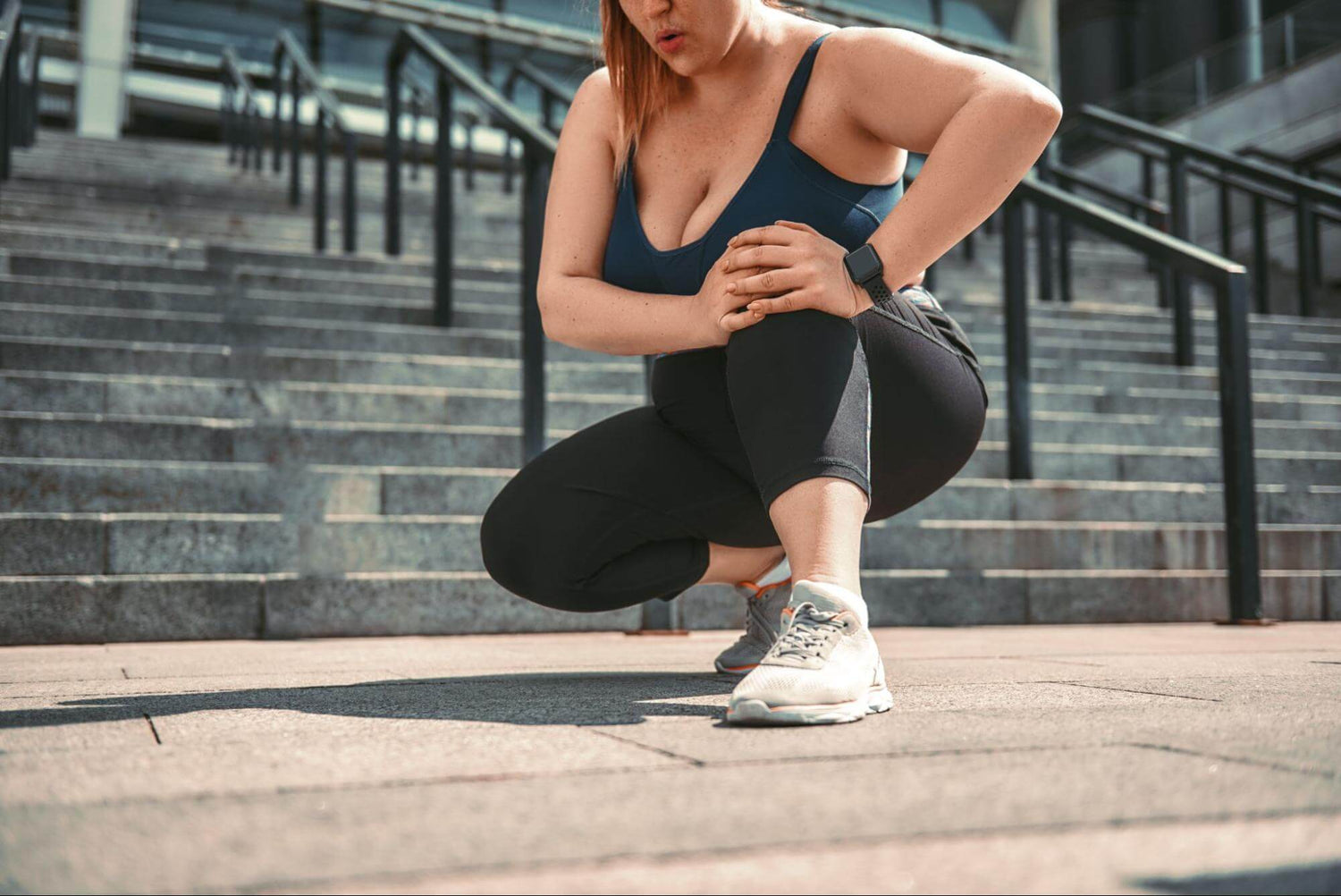 woman thinking how to prevent chafing while running
